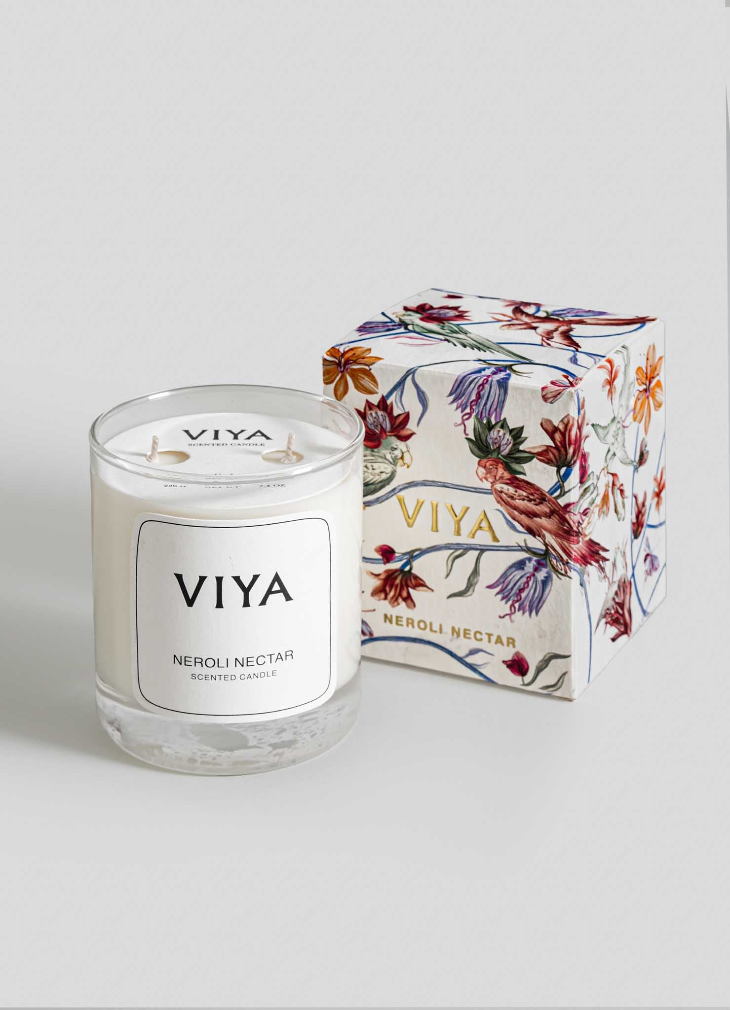 VIYA candle and its packaging on a light gray background viya luxury wax candle