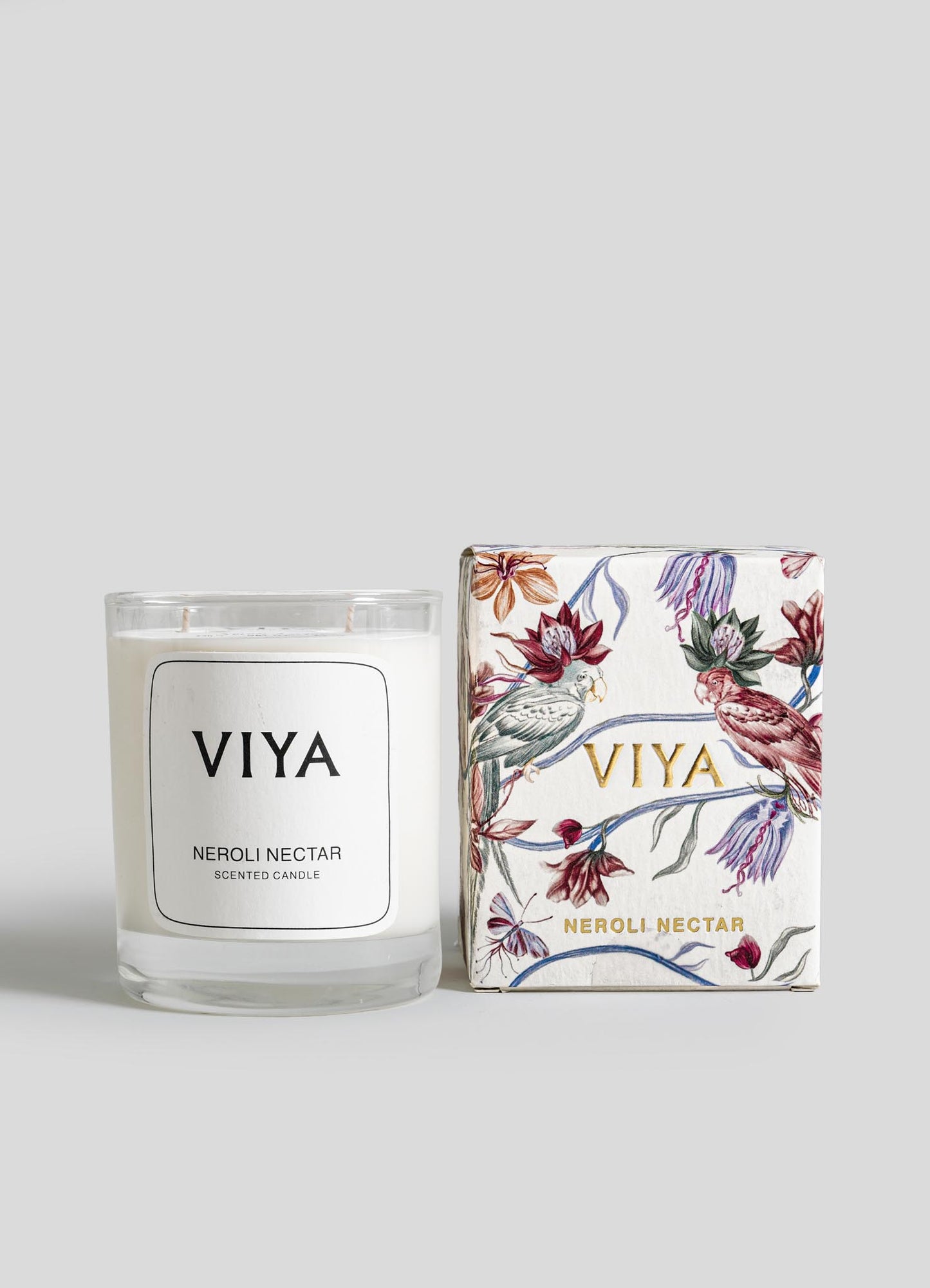 VIYA Neroli Nectar candle and its packaging on a light gray background viya luxury wax candle
