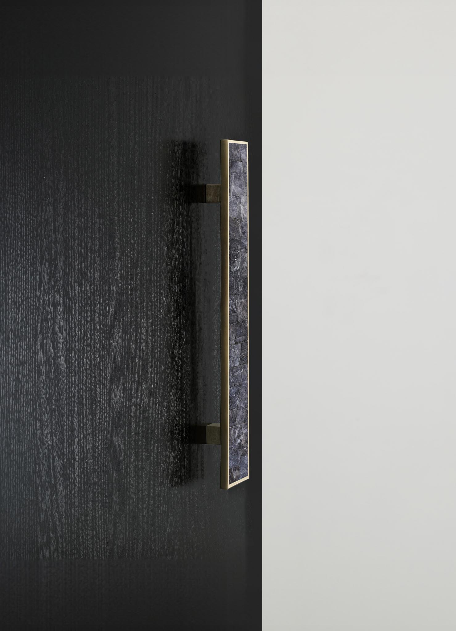 stone handle with brass inlay