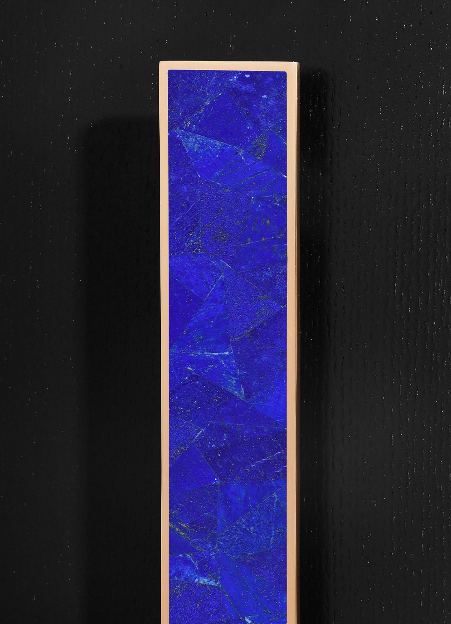 stone handle with brass inlay