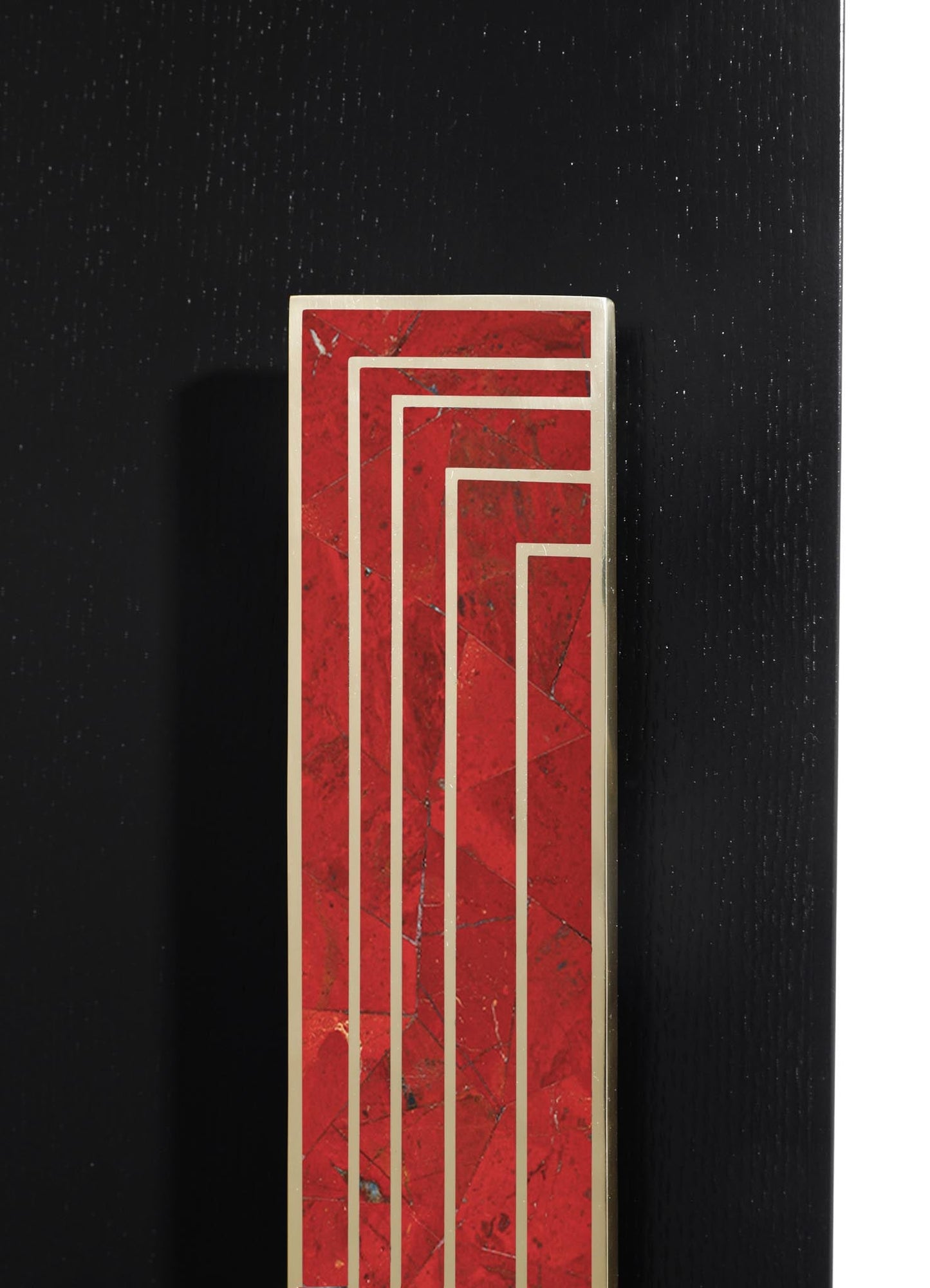 A tall, rectangular decorative panel with a red marble surface featuring white geometric lines. The panel has a metallic frame, set against a black textured background, embodying a contemporary and luxurious style.