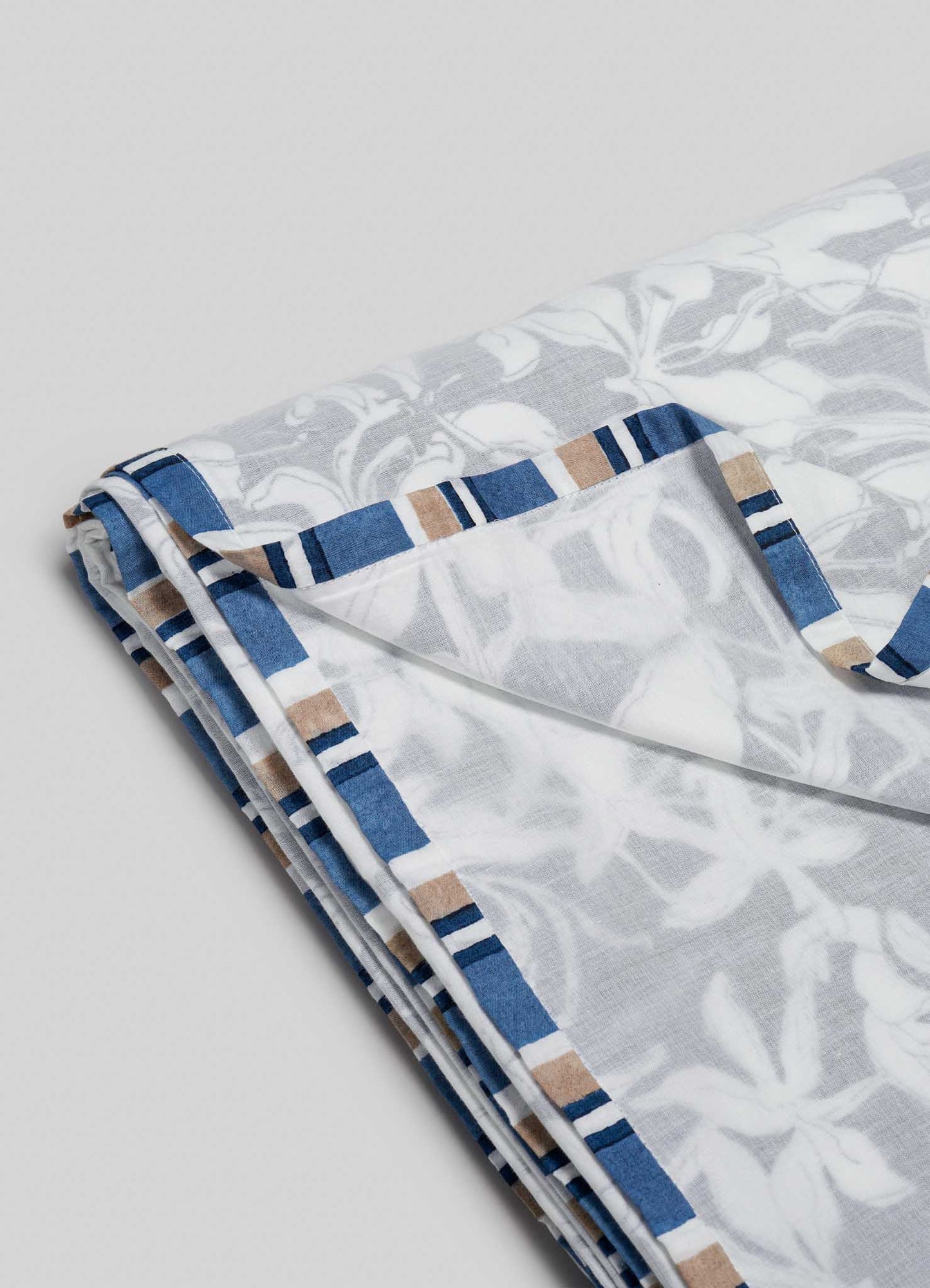 A close-up of the Viya Spring Bouquet Blue Single Dohar, showcasing its intricate Indian garden-inspired patterns.