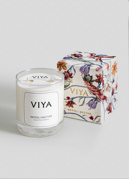 VIYA candle and its packaging on a light gray background viya luxury wax candle