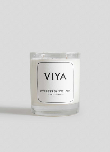 VIYA Cypress Sanctuary scented candle on a light gray background viya luxury wax candle