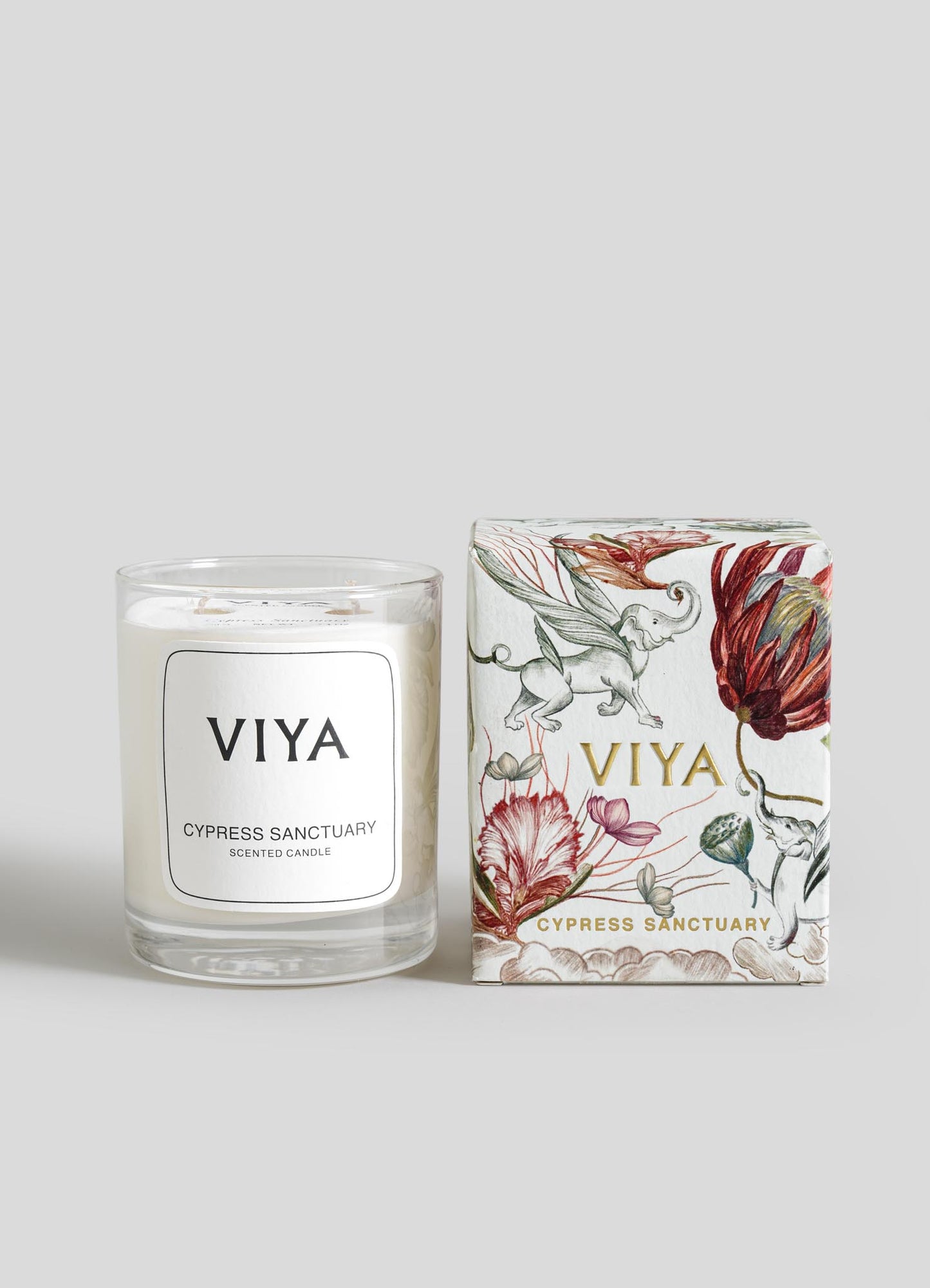 VIYA candle and packaging on a light gray background viya luxury wax candle