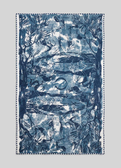 Blue and white patterned towel on a light gray background viya luxury cotton quilt