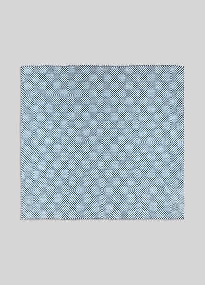 Blue patterned pocket square on a light gray background luxury cotton quilts viya