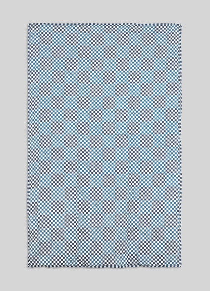 Checkered patterned fabric on a gray background viya luxury cotton quilt
