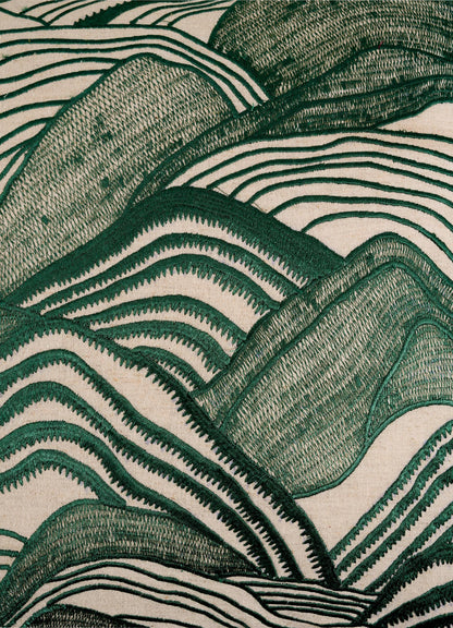 The Viya Dreamscape Green Embroidered Mounds Cushion Cover 18"x18" features abstract green mountains with wavy lines and textured patterns on beige, inspired by Rajput manuscript art and traditional textile motifs.