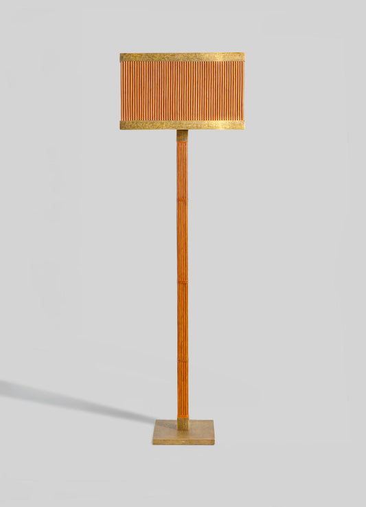The VIYA Namsai Floor Lamp Square features a tall, textured vertical wooden base and a rectangular ribbed lampshade with subtle cane weaving, both in warm wood tones, set on a flat square metal base against a plain light background.