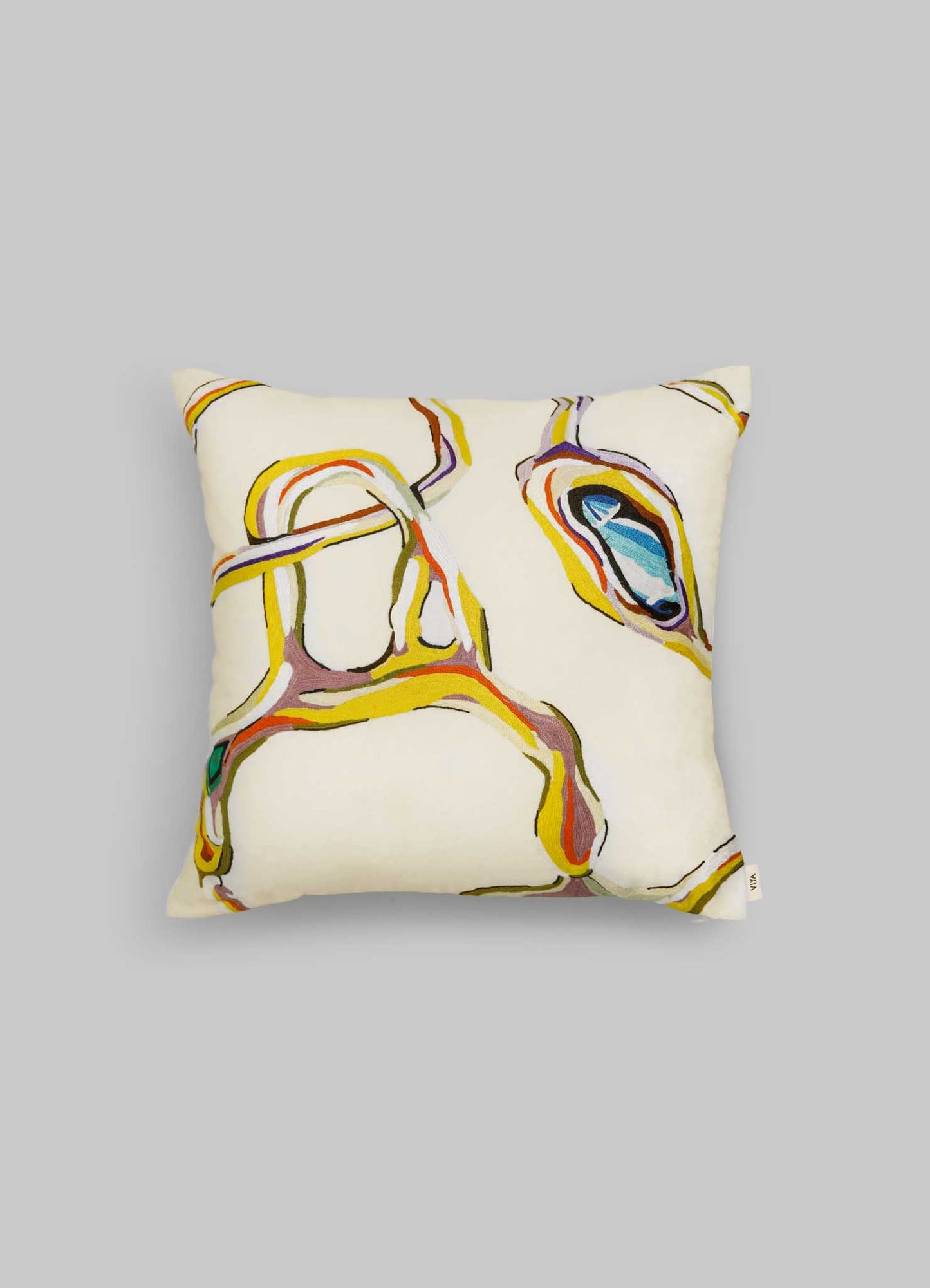 The Viya Tutti Frutti Hand Embroidered Multicolour Cushion Cover 18"x18" features vibrant yellow, orange, blue, and green abstract lines on a light base, reminiscent of artisan style and shown against a plain gray background.