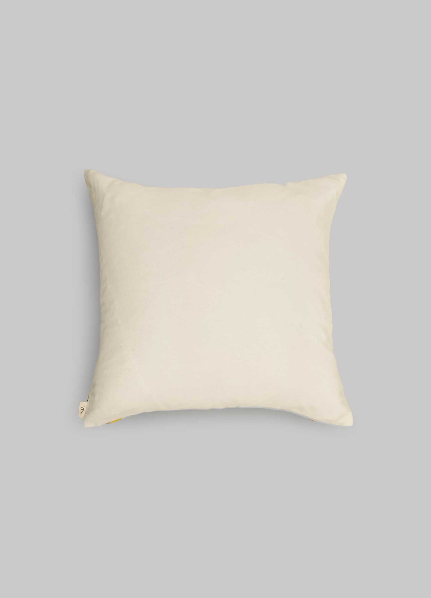A plain, square, off-white pillow with a smooth cover, set against a light gray background—ideal for pairing with Viya's Tutti Frutti Hand Embroidered Multicolour Cushion Cover (18"x18") for a vibrant look.