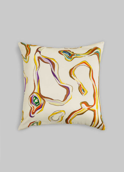 The Viya Tutti Frutti Hand Embroidered Multicolour Cushion Cover (24"x24") features a cream base with abstract wavy lines in orange, yellow, green, purple, and teal—ideal for adding vibrant style to any space. Shown on a plain gray background.